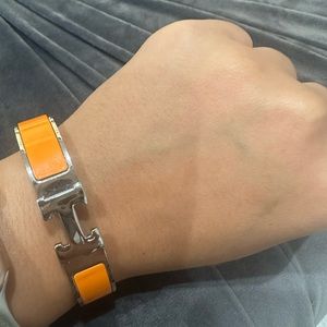 Orange H cuff